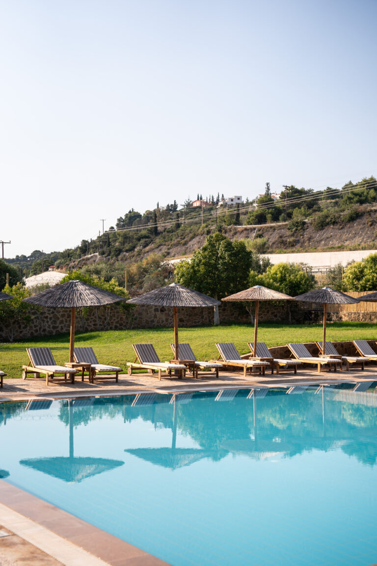 B&W-boho-resort-hotel-pool-with-sunbeds