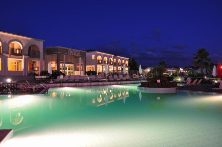 arta-palace-hotel-pool-by-night