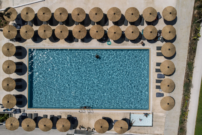 elion-seaside-resort-hotel-evia-pool-with-sunbeds