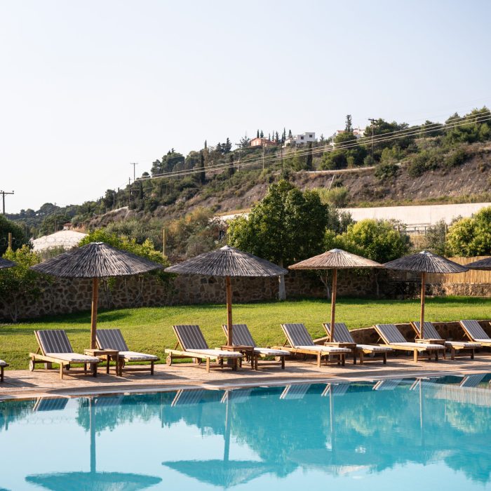 B&W-boho-resort-hotel-pool-with-sunbeds