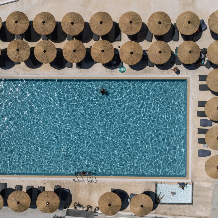 elion-seaside-resort-hotel-evia-pool-with-sunbeds